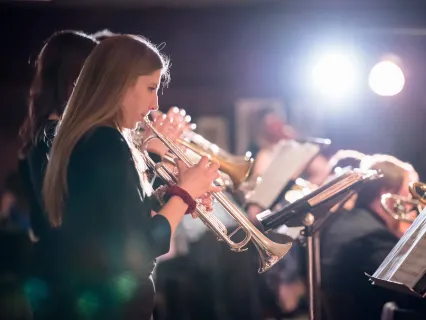 Woman playing trumpet