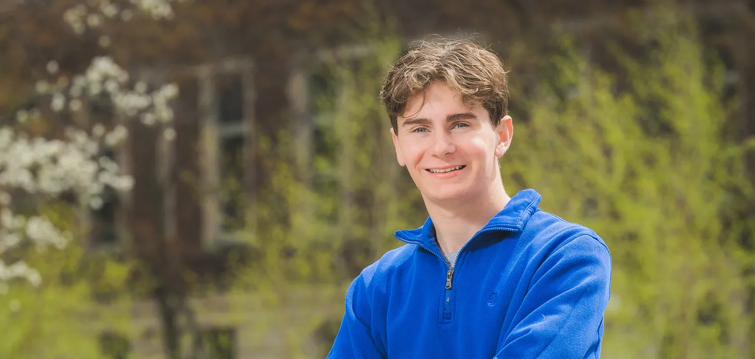 Dominic Lagona standing on St. Norbert College campus