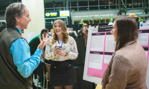 St. Norbert College students present research at Tiny Earth