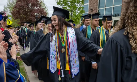 Excited graduates at SNC Commencement