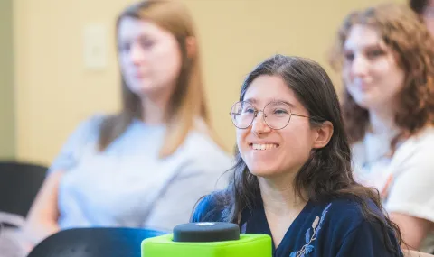 SNC students attending a session with alumni