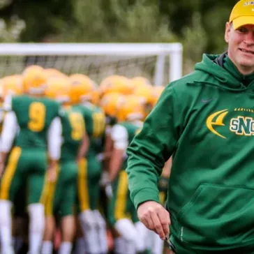 Fast-Tracked Coach Takes Green Knight Football Unbeaten Into the Post-Season