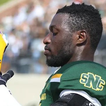 Ghanaian Soccer Player Rises to Challenge on SNC Gridiron