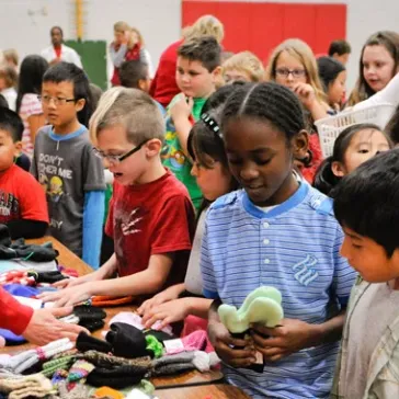 Sophomore’s Crafty Efforts Outfit an Entire Elementary School Against the Cold
