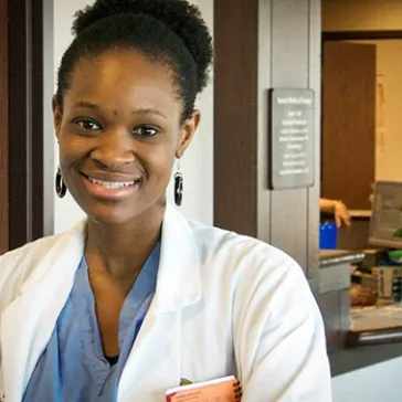 2004 Grad With Nigerian Team in Challenging Conjoined Twins Surgery